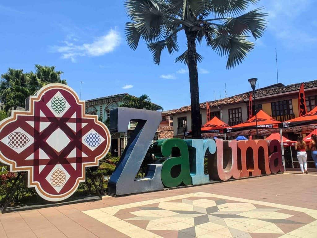 Zaruma Ecuador main square sign that says Zaruma