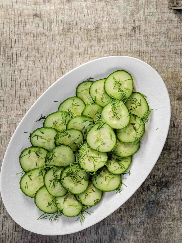 Finnish cucumber salad is too easy to make for it to be this delicious. Bring it to your next potluck, picnic or family dinner for an easy summer side.