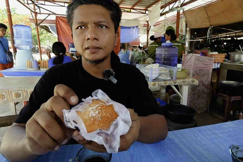 Alan with torta at Oslob Public Market