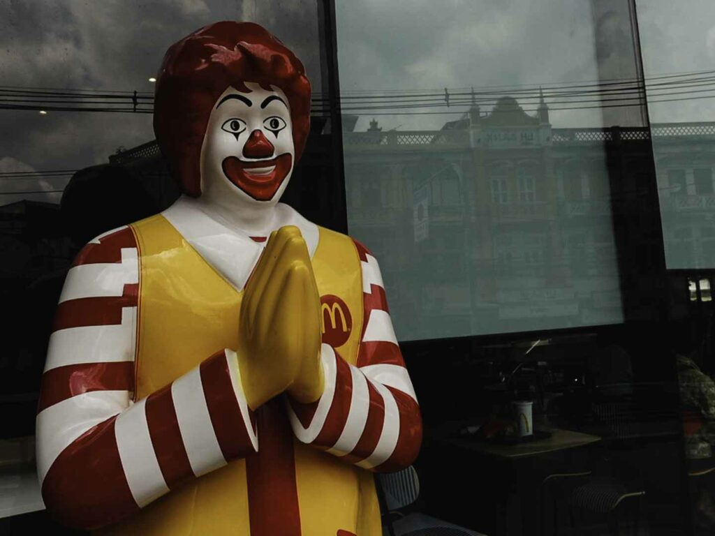 Ronald McDonald with hands together in Thailand