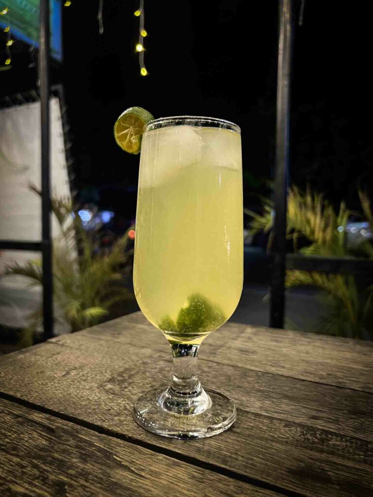 Filipino Calamansi Juice on a wooden restaurant table