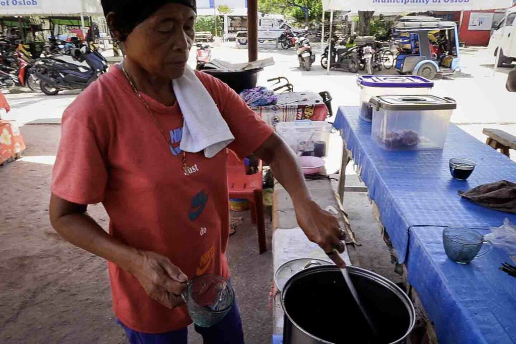 Market Vendor selling sikwate