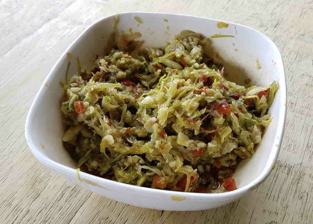 Palapa Filipino Muslim food condiment in a white bowl on wooden table