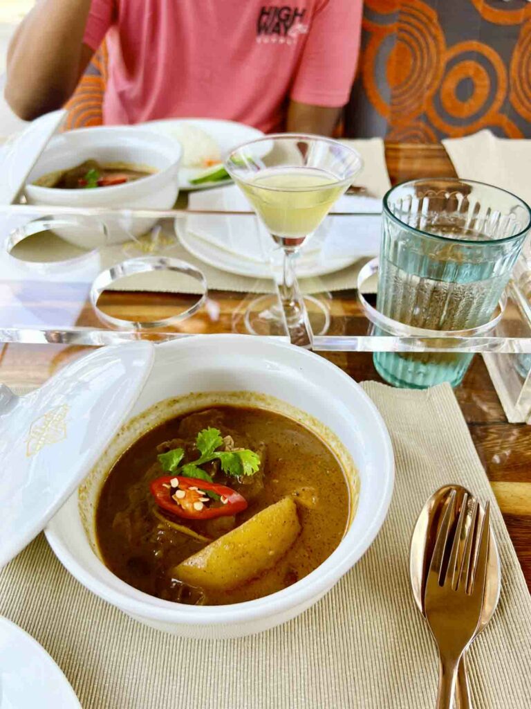 Massaman Curry on dining table of Thai Bus Food Tour in Bangkok