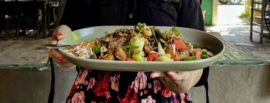 Ayngelina holding plate of Ayutthaya river prawns