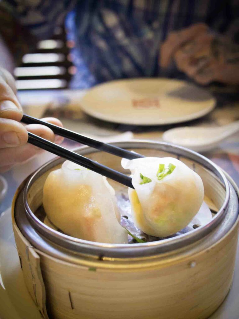 Steamed dumplings in bamboo steamer