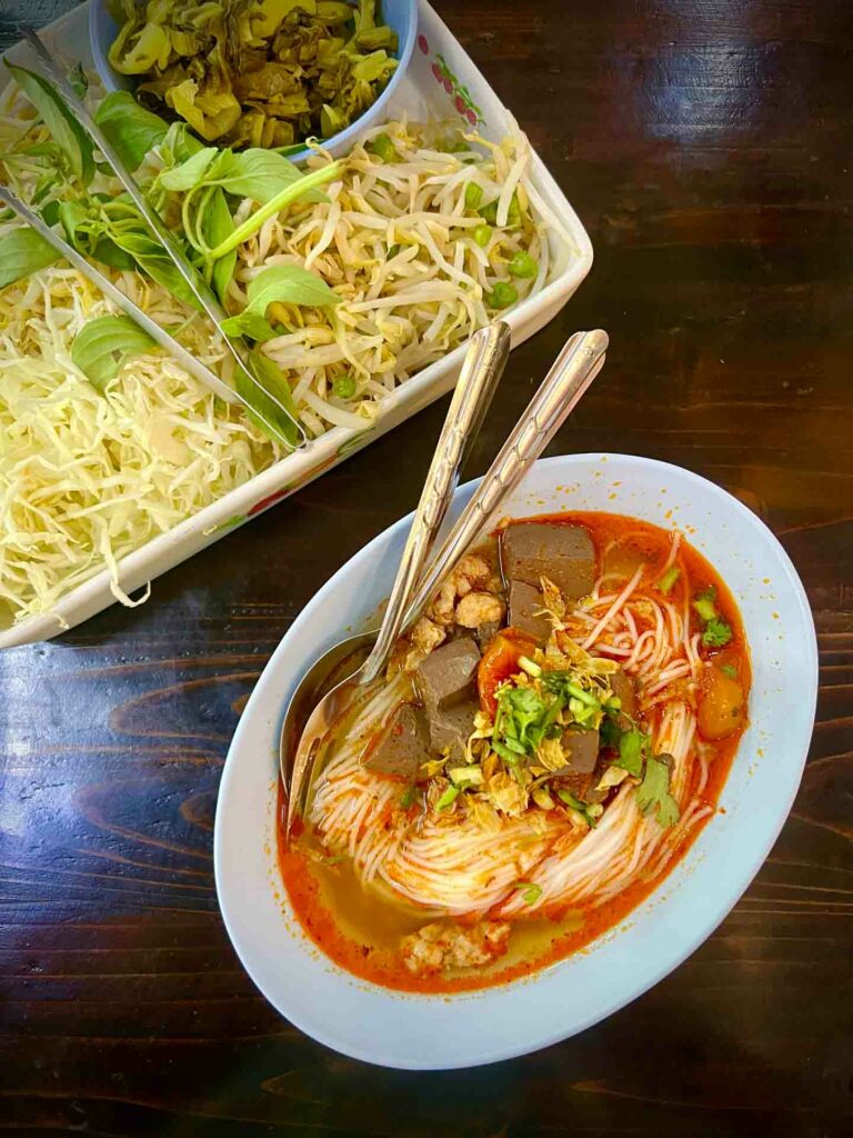 Khanom Jeen Nam Ngiaw served at Waroros market in Chiang Mai