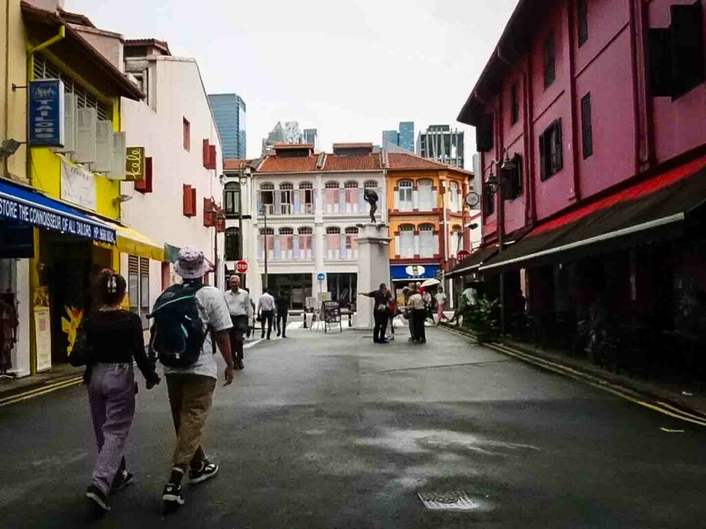 Singapore Chinatown Temple people walking on rainy day