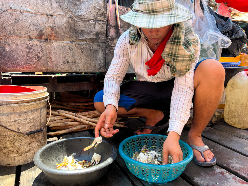 kep blue crab seller at seafood market